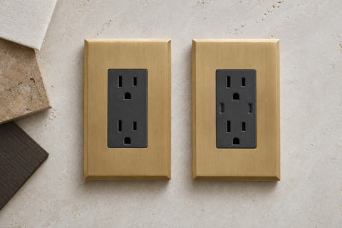 Standard duplex outlet beside a USB-C outlet in satin brass plates