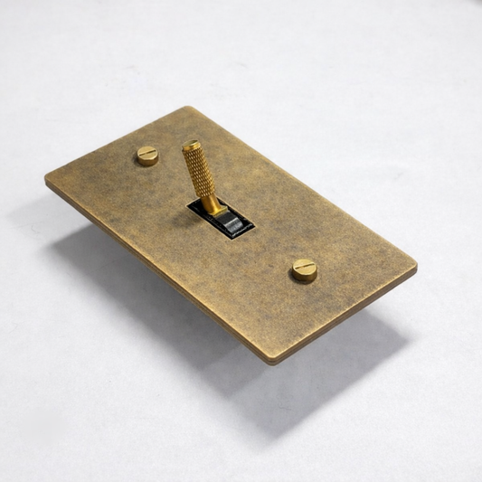 Aged brass with patina 1-gang toggle switch plate