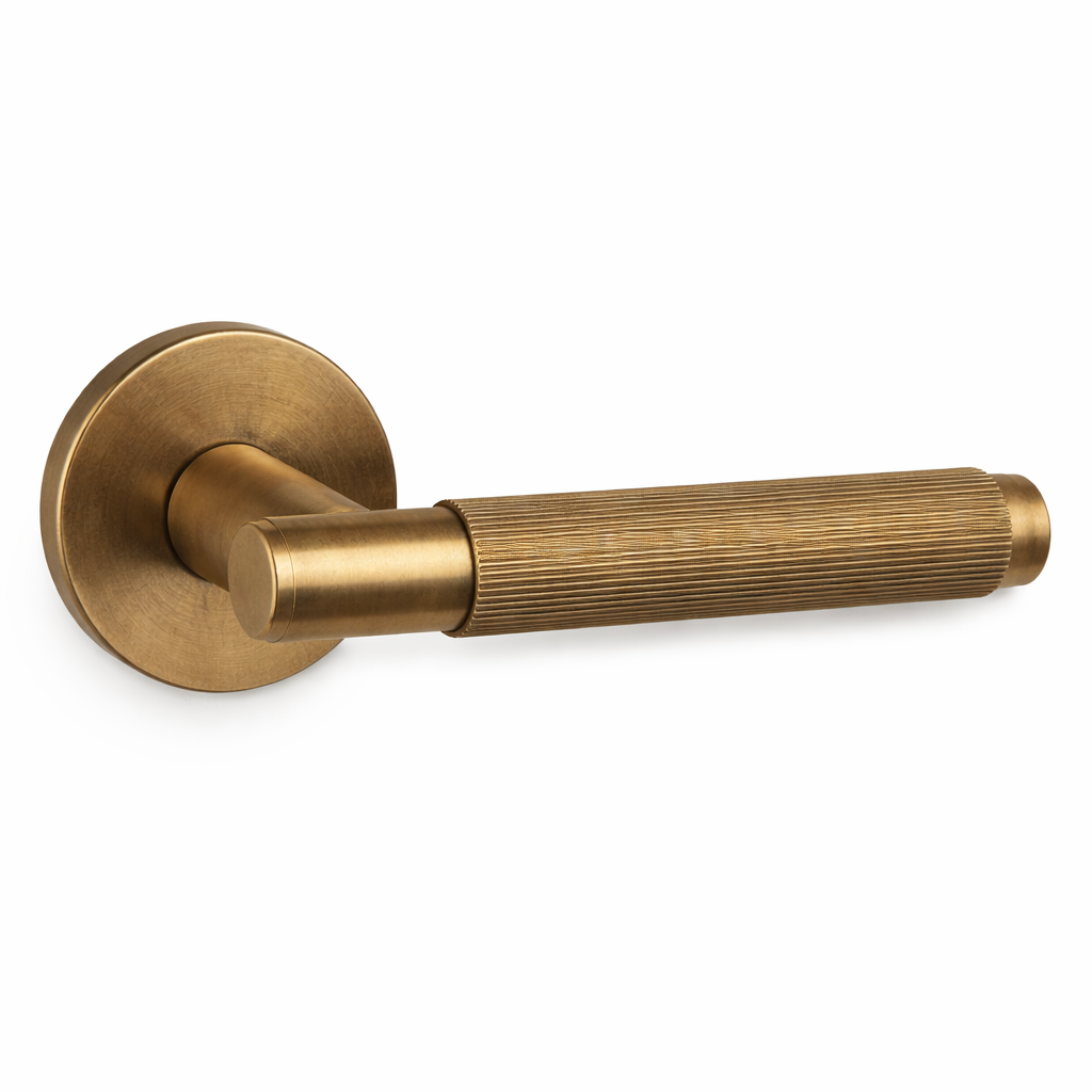 Fluted Door Handle on Round Rose - Aged brass