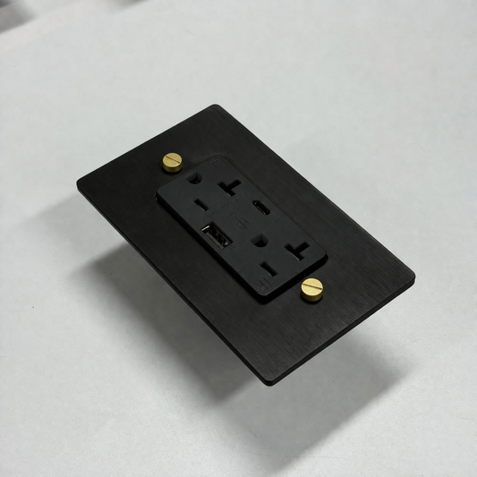Matte Black & Brass USB duplex outlet plate, angled view