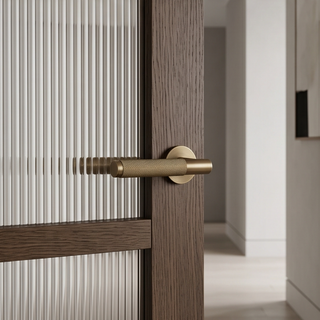Knurled Door Handle on Round Rose - Aged Brass