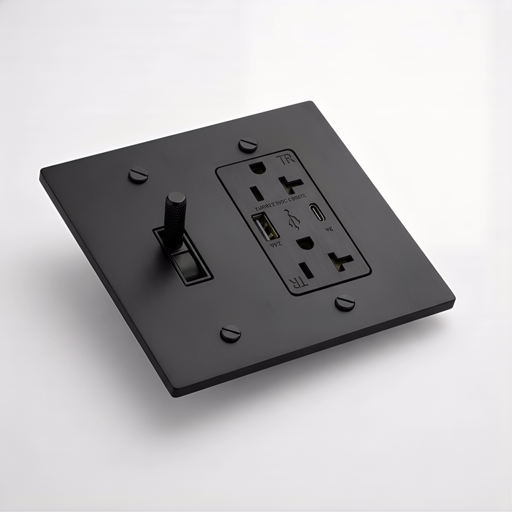 Matte Black toggle switch and USB outlet combination plate, angled view